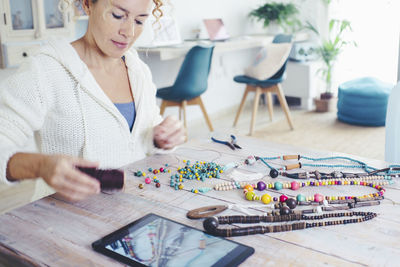 Portrait of woman working at table