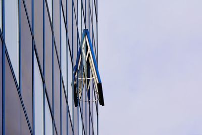 Low angle view of built structure against clear blue sky