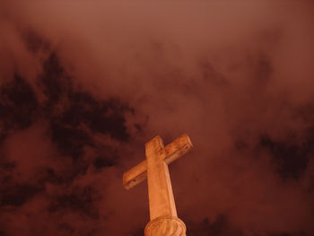 Low angle view of statue against sky