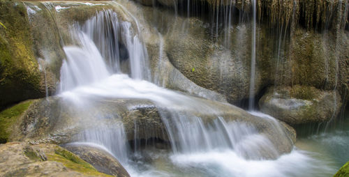 Scenic view of waterfall in forest