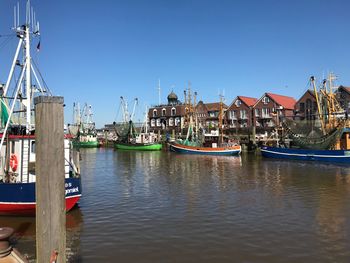 Boats moored in harbor