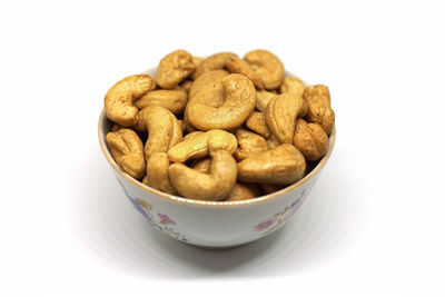 High angle view of dessert in bowl against white background