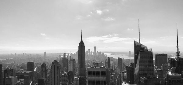 Modern buildings in city against sky