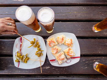 Directly above shot of beer glass on table