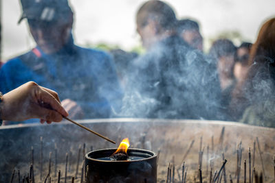 Two people on barbecue grill
