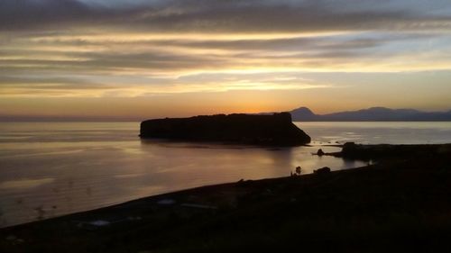 Scenic view of sea at sunset