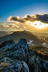 Scenic view of landscape against sky during sunset