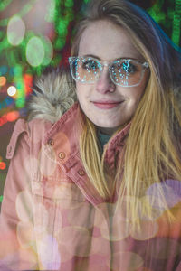 Portrait of smiling woman wearing sunglasses