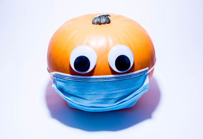 Close-up of pumpkin against white background