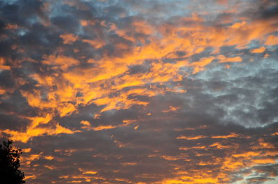 Low angle view of clouds in sky during sunset