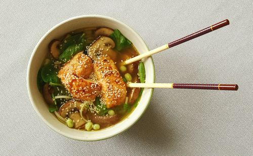 Directly above shot of ramen noodles served in bowl on table