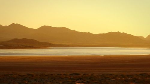 Scenic view of mountains at sunset