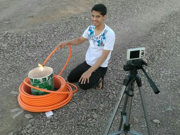 one person, technology, cable, full length, one woman only, looking down, working, adults only, only women, people, adult, one young woman only, outdoors, young adult, day