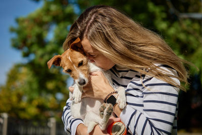 Portrait of woman with dog