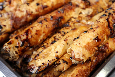 High angle view of meat on barbecue grill