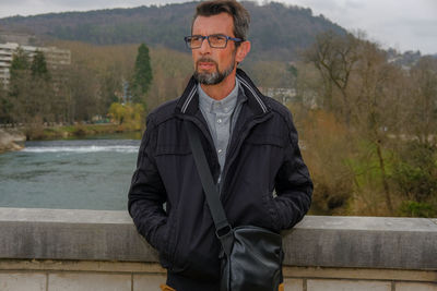 Full length portrait of man standing outdoors