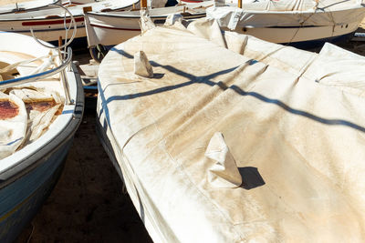 High angle view of sailboats moored in sea