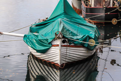 Fishing boat moored in lake