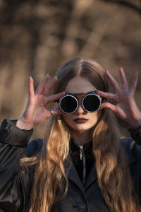 Young woman wearing sunglasses