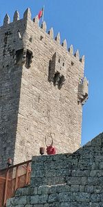 Low angle view of fort against the sky