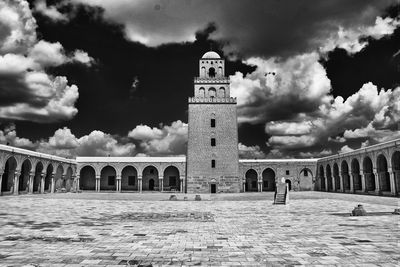 View of historic building against cloudy sky