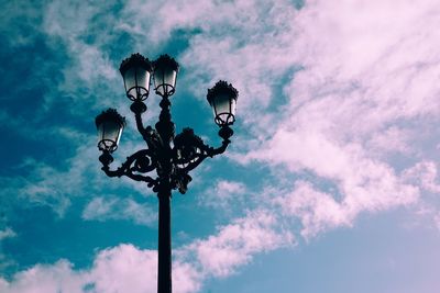 Low angle view of street light against sky