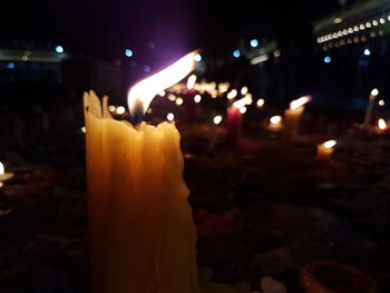 Close-up of illuminated candles