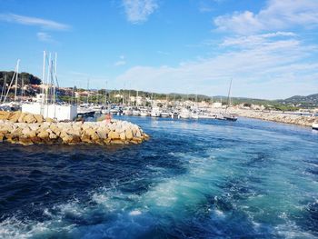 Scenic view of sea against blue sky