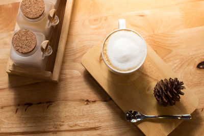High angle view of coffee cup on table