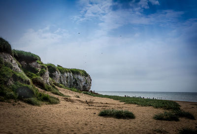 Scenic view of beach against sky