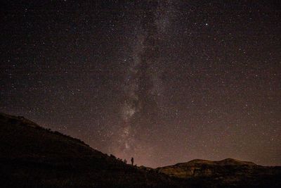 Low angle view of star field against sky at night