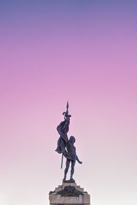 Statue of liberty against sky during sunset