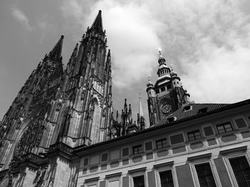 Low angle view of cathedral against cloudy sky
