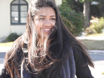 Portrait of smiling young woman