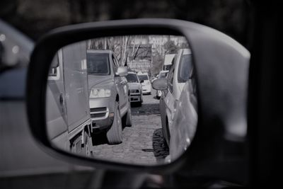 Close-up of side-view mirror of car