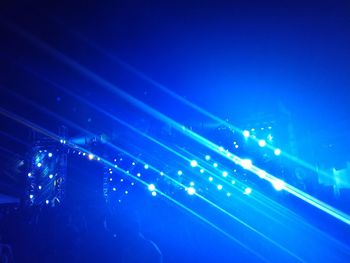 Aerial view of illuminated stage at night