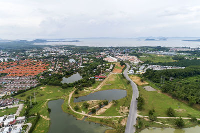 High angle view of road amidst buildings in city