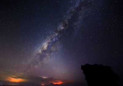 Low angle view of stars in sky at night