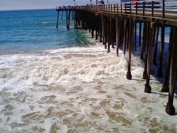 Pier on sea against sky