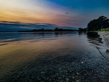 Scenic view of beach during sunset