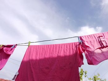 Low angle view of clothes hanging on clothesline