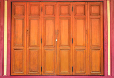 Closed wooden door of building