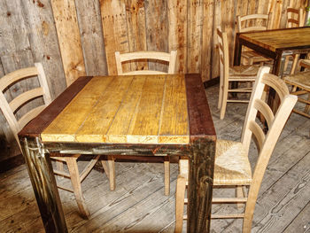 An industrial-style iron and wood table seen from above