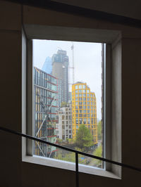 Buildings seen through window