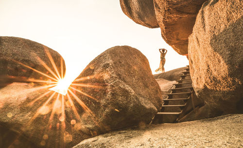 Low angle view of rock formation against sky