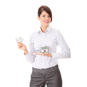 Smiling young woman holding drink against white background
