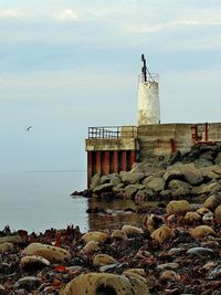 Below the harbour wall