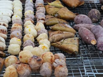 High angle view of meat on barbecue grill