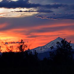 Scenic view of mountains at sunset