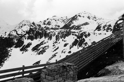 Scenic view of mountains against sky during winter